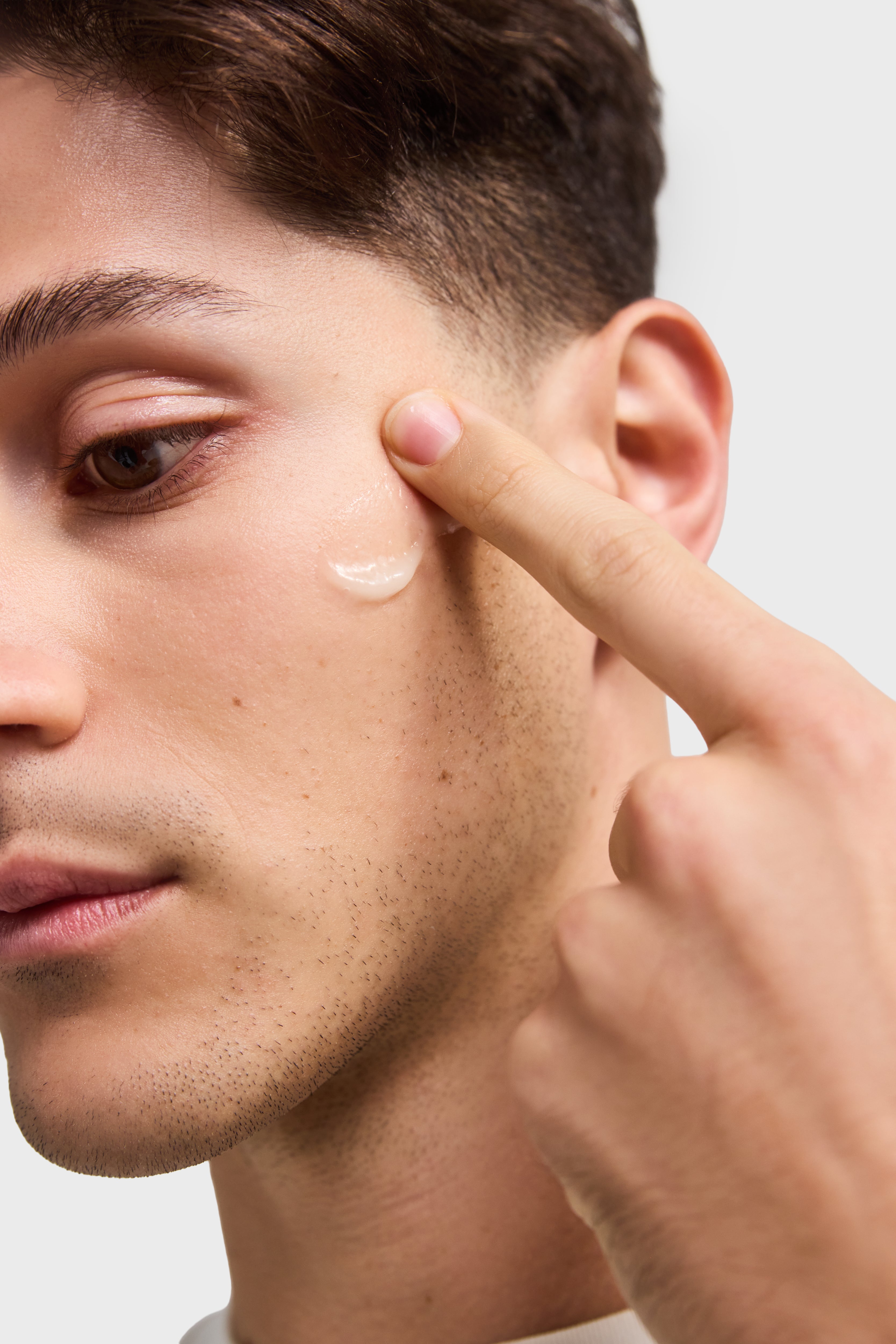 Image of boy using skincare